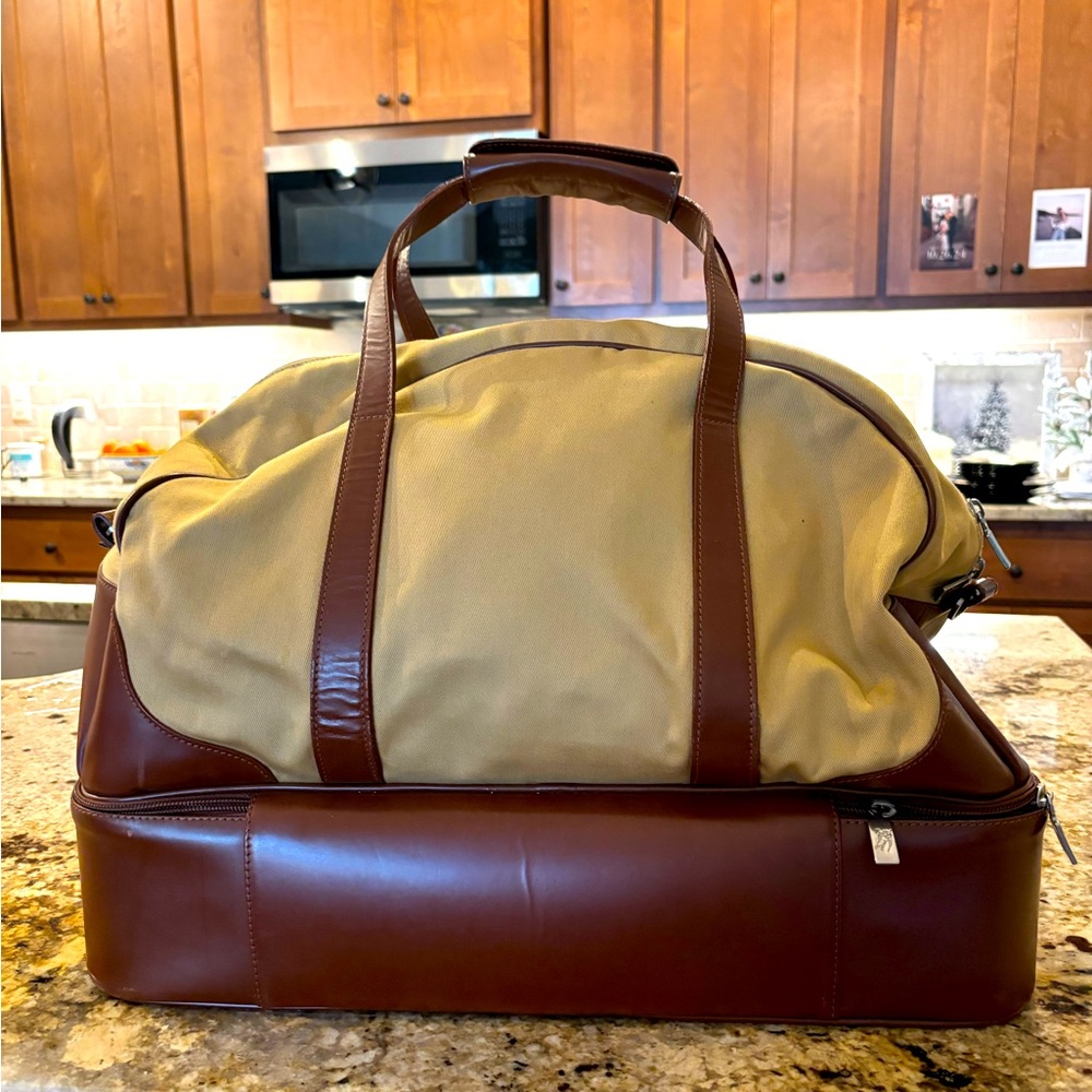 Classic Burberry golf bag. 18” long. Depth 11.5” Height 16”.   Leather & canvas